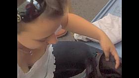 Amateur in light white blouse seducing down the blouse