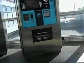 Girl with a big butt waits in a line