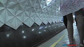 Blonde milf shows off sexy legs in candid upskirts