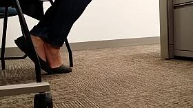 A Look At An Office Managers Well Worn Black Ballet Flats