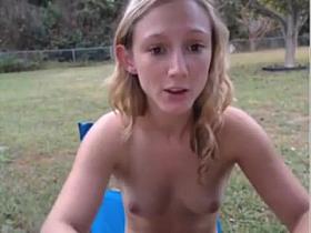Camgirl plays in the park