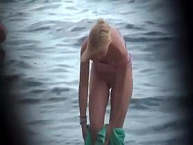 She wraps a towel around her body