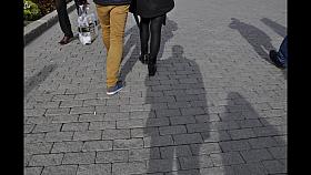 Sexy girl in very shiny black opaque tights