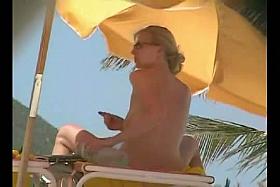 Sexy chicks are being filmed on the beach