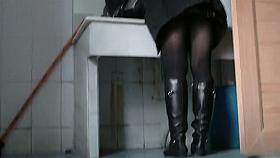 Crouching toilette black hair woman wiping her ass after taking a shit