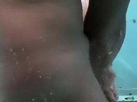 Mature woman spied while showering