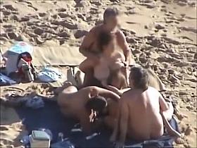 Group sex at a nudist beach