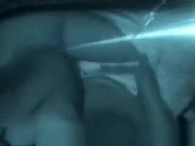 Couple having sex into a car