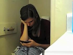 Teen spied in toilet pissing
