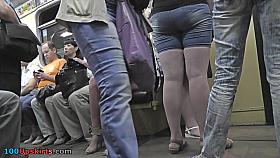 Upskirting thong footage of a brunette in mini skirt