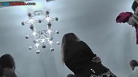 Amateur babe shows off g-string in candid upskirts clip