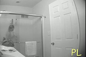 Hidden bathroom cam video of a blonde with tiny titties