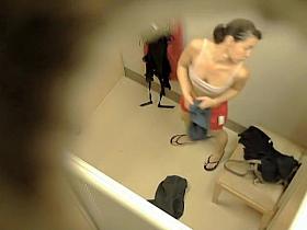 Blonde and brunette naked boobs in the changing room