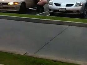 Security cam shoots amateur pissing between two cars