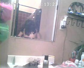 Brunette showing Tits in Bathroom Hidden Cam
