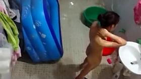 Spying on Thai neighbor taking a bath outside