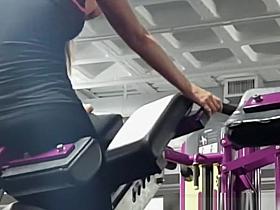 Fit brunette girl spied in the gym exercising