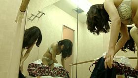 A ballet dancing girl is in the dressing room getting undress to a spy camera
