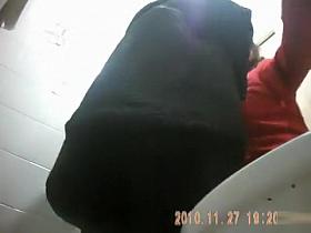 Curvy woman and her fat mom piss in public toilet