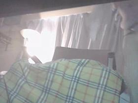 Voyeur cam sex video shows a hot chick jilling off