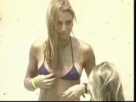 Blonde cutie undressing - beach voyeur video