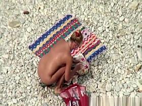 Nudist woman refresh in the water