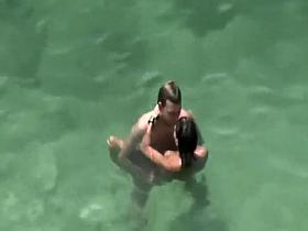 Hot teen girls cover friend with sand