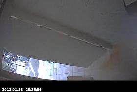 Long hair chick spied in public toilet peeing