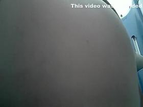 Woman takes pee in portable