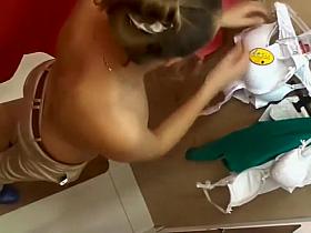 Peeping on a hot girl trying a new bra