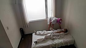 Nasty Doctor attending to patient in quarantine for coronavirus COVID 19