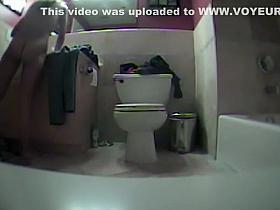 Naked girl finishing her bathroom routine