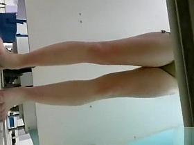 My buddy's wife undresses in the changing booth