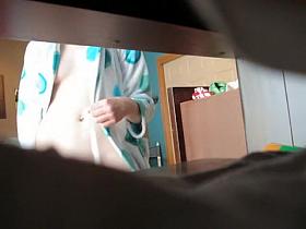 Voyeur cam shooting nudity of young doll after shower