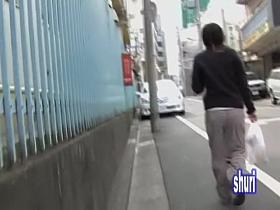 Bombastic Asian gal gets her breasts squeezed by some random bloke