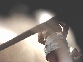 Girl in thong bent over in doggy putting on skirt on spy cam