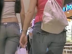 Brunette stunner wears tight jeans for some street candid magic