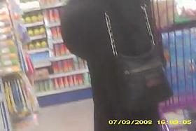 ebony with a ass that pokes out(hidden cam)