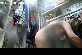 Wife undressing in dressing room