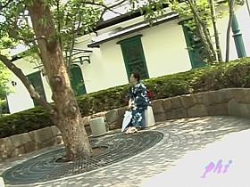 Sharking video shows a Japanese chick in a kimono in a park