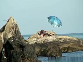 Couple caught fucking in the rocks