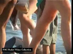 Awesome hot redhead babe gets nude for beach voyeur videos