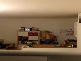 Neighbor spied in her apartment topless