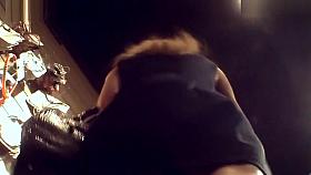 A Girl With Curly Chestnut Hair In Candid Upskirt