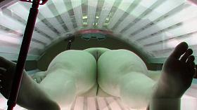 Busty Chubby Girl Relaxing in Solarium Tanning Bed