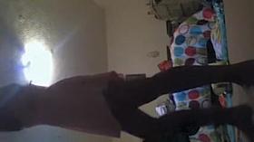 Solo spy cam girl making the bed and getting dressed