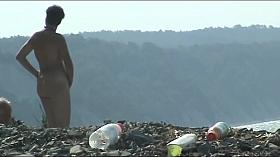 Mature woman with a big ass on a nudist beach