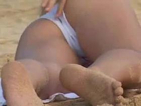 hot flashing blonde at the beach