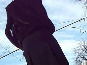 Lady in a hobble-skirt appears in the upskirt scene