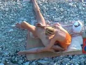 Hot girl jarking boyfriend at public beach